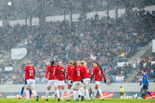 Ada Hegerberg of Norway celebrates with teammates