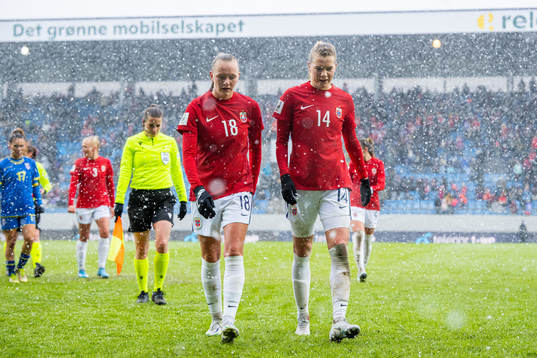 Frida Maanum and Ada Hegerberg of Norway at half-time