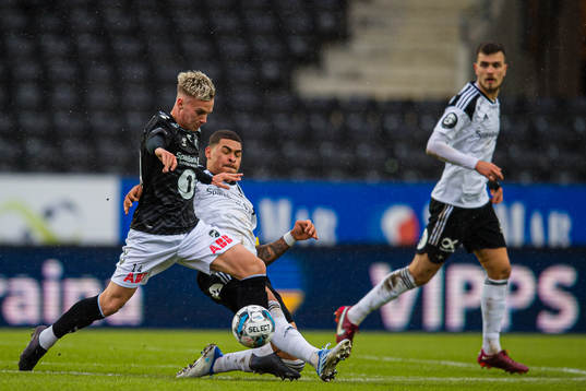 Conrad Wallem of Odd and Noah Jean Holm of Rosenborg