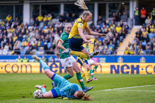 Stina Blackstenius of Sweden against goalkeeper Courtney