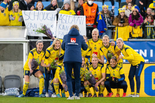 Players of Sweden pose for a photo