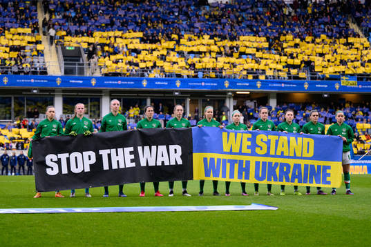 Players of Ireland participate in a manifestation against