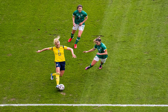 Stina Blackstenius of Sweden and Jamie Finn of Ireland