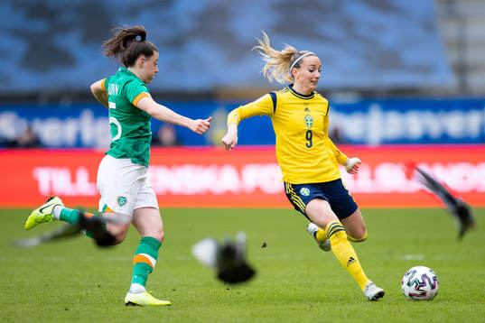 Lucy Quinn of Ireland and Kosovare Asllani of Sweden