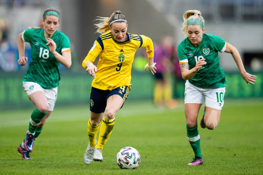 Chloe Mustaki and Denise O'Sullivan chasing Kosovare