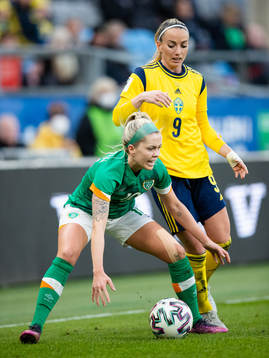 Denise O'Sullivan of Ireland and Kosovare Asllani of Sweden