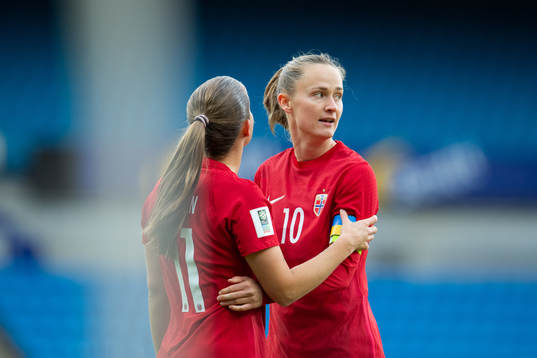 Caroline Graham Hansen and Guro Reiten of Norway celebrate