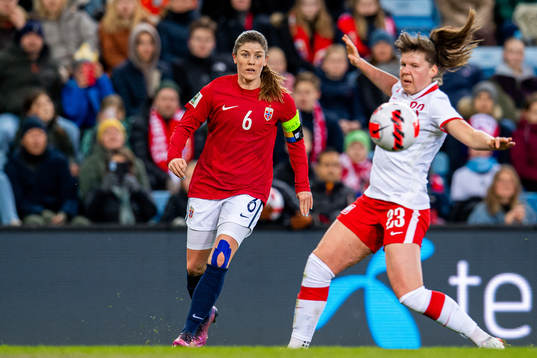 Maren Mjelde of Norway and Adriana Achcinska of Poland