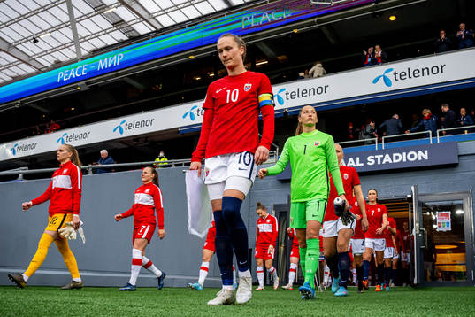 Caroline Graham Hansen and goalkeeper Cecilie Fiskerstrand
