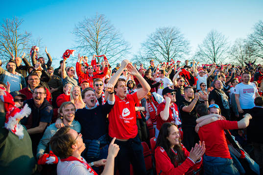 Spectators in the stands celebrates