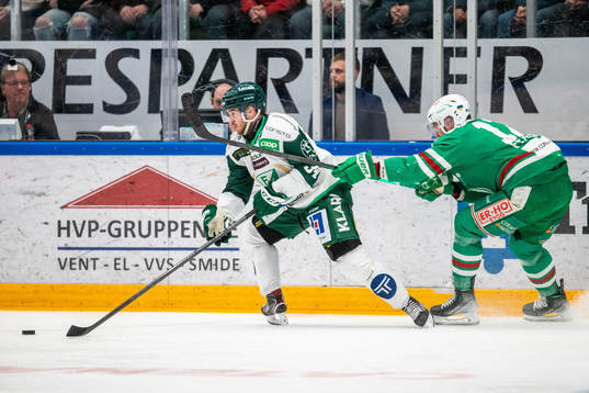 Färjestads Michael Lindqvist och Rögles Brady Ferguson