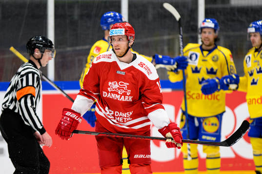 Matias Lassen of Denmark looks dejected