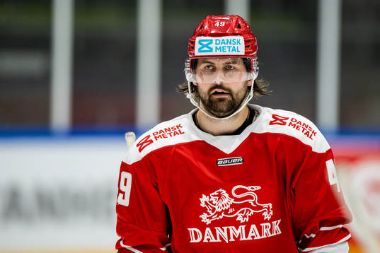 Christopher Frederiksen of Denmark looks dejected