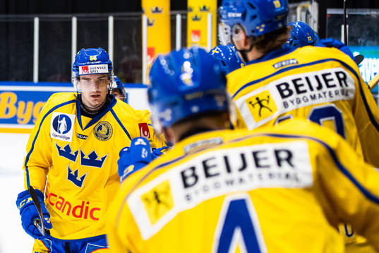 Nils Åman of Sweden celebrates with team mates
