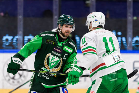 Färjestads Linus Johansson och Rögles Mattias Sjögren