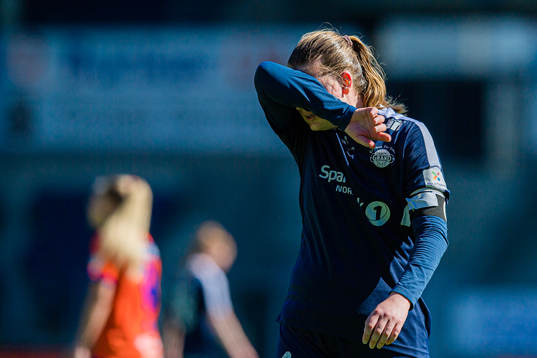 Cecilie Falch of Grand Bodø looks dejected