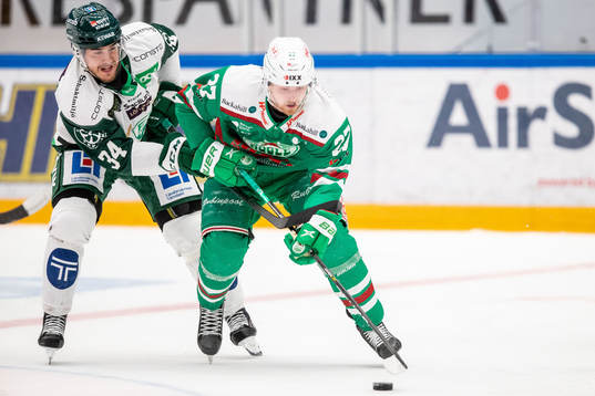 Färjestads Michael Lindqvist och Rögles Oliver Tärnström