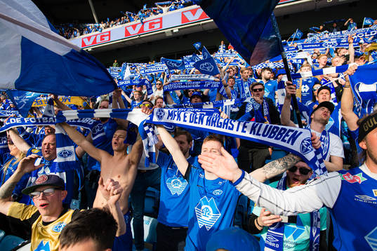 Spectators in the stands celebrates