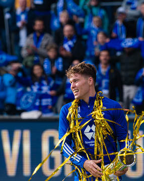 Emil Varhaugvik Breivik of Molde celebrates with the trophy