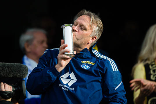 Erling Moe, head coach of Molde, celebrates with the trophy