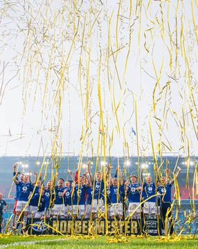 Players of Molde celebrates with the trophy