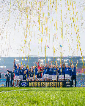 Players of Molde celebrates with the trophy