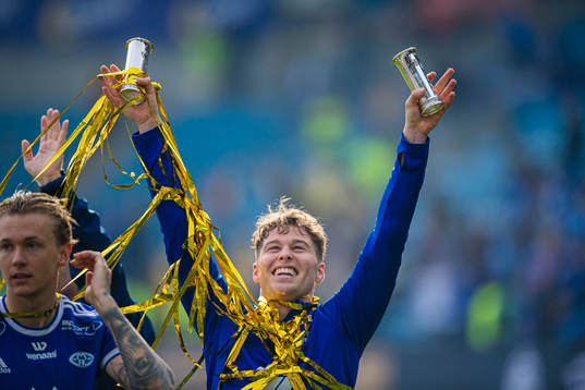 Emil Varhaugvik Breivik of Molde celebrates with the trophy