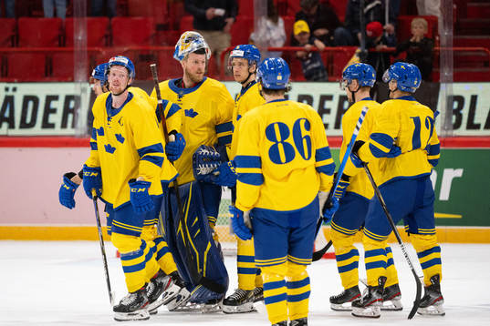 Joakim Nordström and goalkeeper Magnus Hellberg look