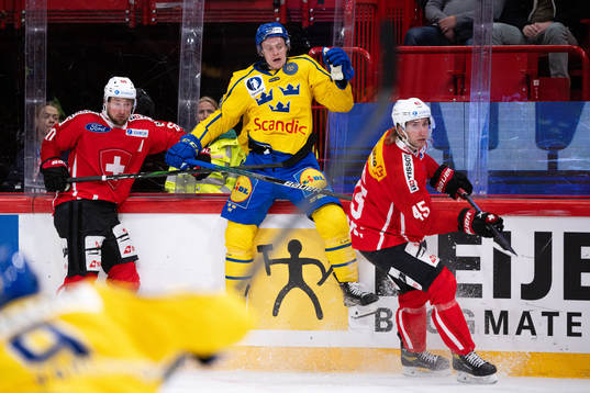 Anton Bengtsson of Sweden against Tristan Scherwey and