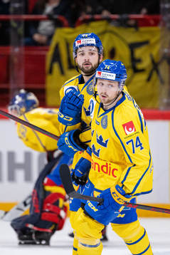 Emil Bemström and Rasmus Asplund of Sweden celebrate the