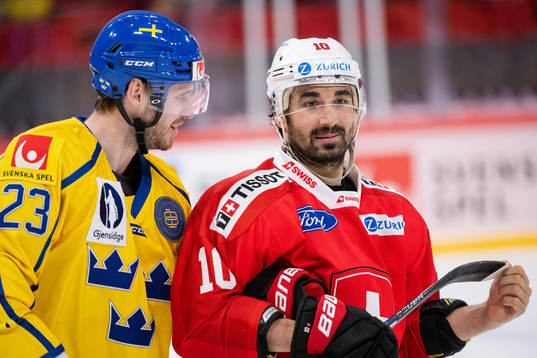 Oliver Ekman-Larsson of Sweden and Andres Ambühl of