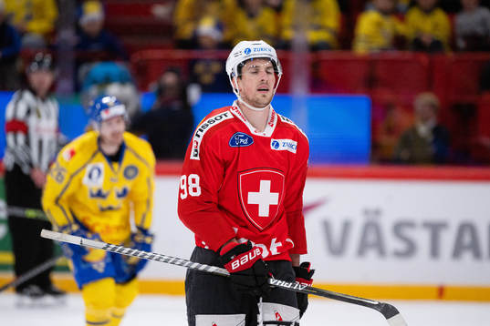 Marco Miranda of Switzerland looks dejected