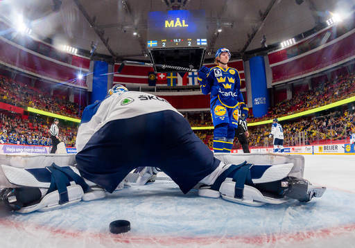 Rasmus Dahlin of Sweden celebrates the 3-2 goal by Joel