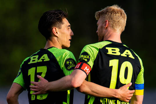 Svenn Crone of Brann celebrates with teammate Sivert Heltne