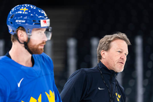 Adam Larsson and head coach Johan Garpenlöv