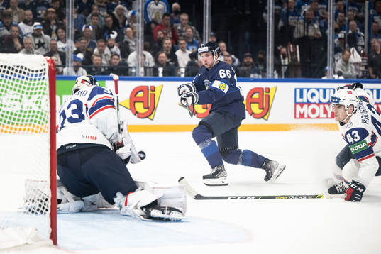 Goaltender Henrik Haukeland and Max Krogdahl of Norway
