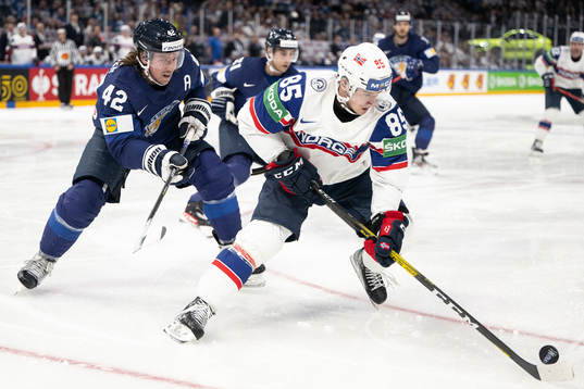 Sami Vatanen of Finland and Michael Haga of Norway