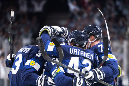 Jere Sallinen of Finland celebrate with teammates