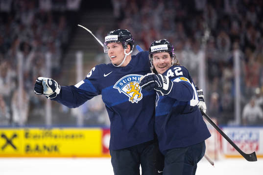 Jere Sallinen and Sami Vatanen of Finland celebrate the 5-0