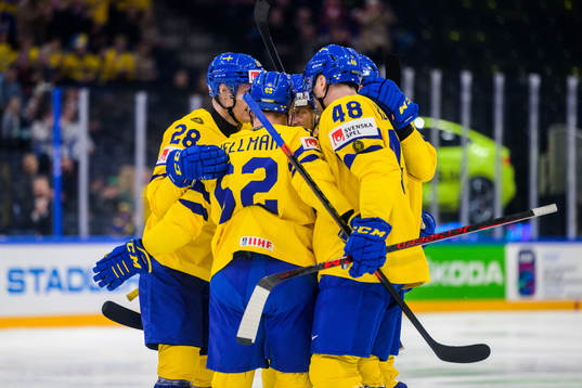 Joel Kellman of Sweden celebrate with teammates