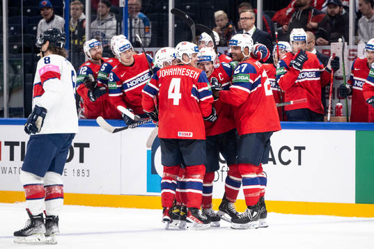Mathis Olimb of Norway celebrate with teammates