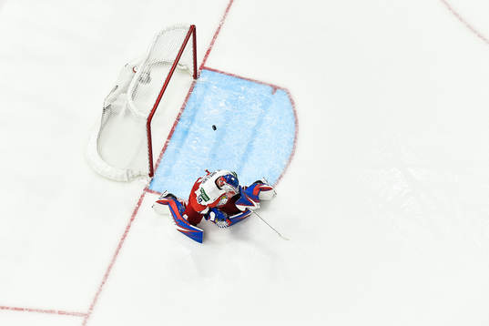 Mathias Bromé of Sweden (not in picture) scores 1-3 behind