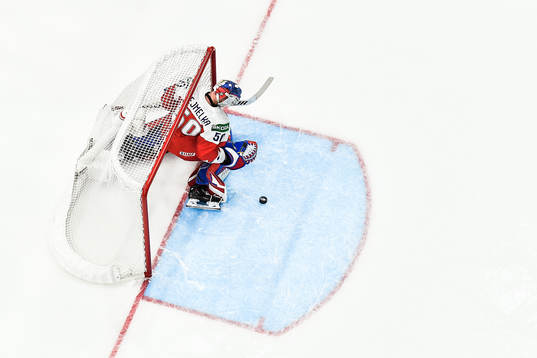 goaltender Karel Vejmelka of Czech Republic looks dejected