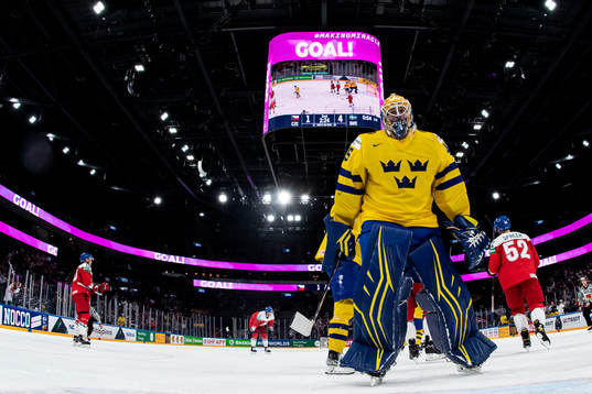 Goaltender Magnus Hellberg of Sweden looks dejected