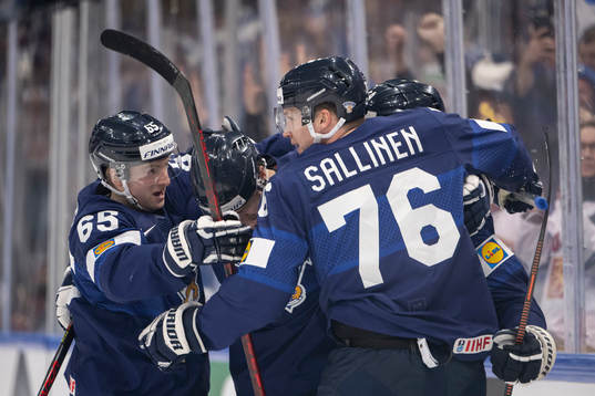 Mikael Granlund of Finland celebrate with Saku Mäenalanen