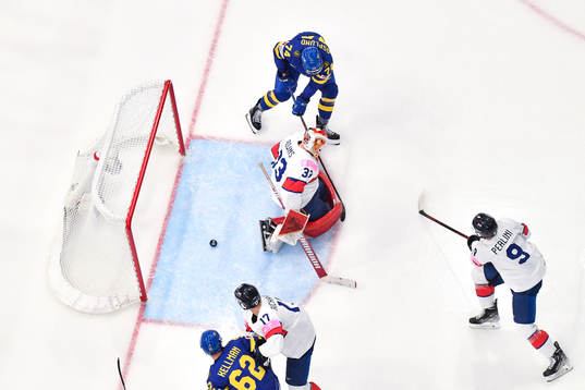 Rasmus Asplund of Sweden scores the 1-0 goal behind