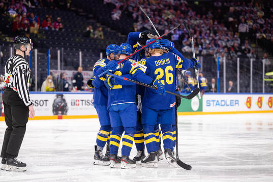Players of Sweden celebrate the 1-0 goal by Rasmus Asplund