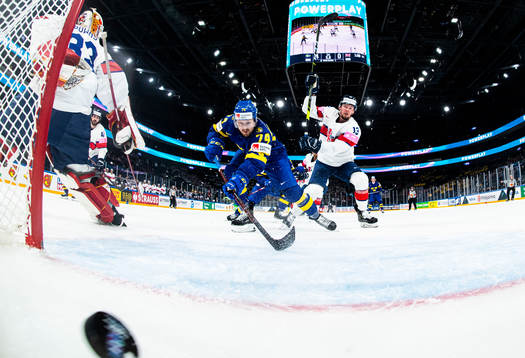 Rasmus Asplund of Sweden scores the 5-0 goal behind