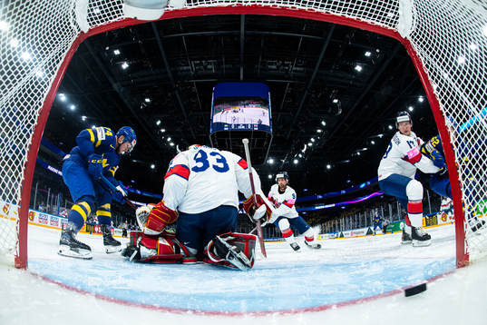 Rasmus Asplund of Sweden scores the 1-0 goal behind