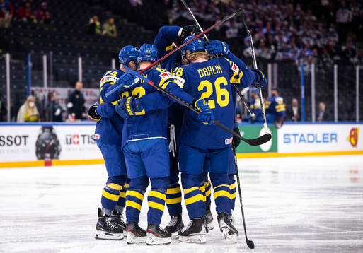 Rasmus Asplund of Sweden celebrate with teammates